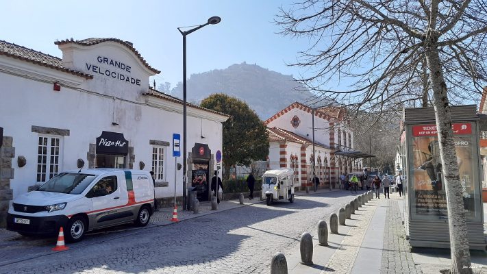 Rua Doutor Alfredo da Costa, Sintra, Lisbon. In the background the famous Torre da Quinta da Regaleira 500 m above main sea level. Street view far are the old train station Sintra.