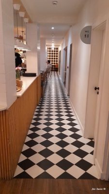 Long aisle in the very small but cosy Cafe Hygge Picoas