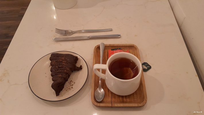 Chocolate cake and tea Hygge Cafe
